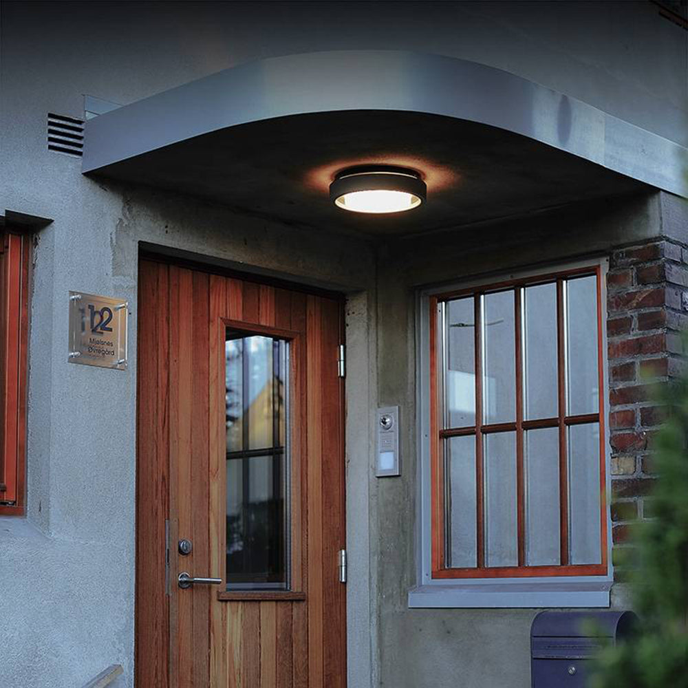 Ray Modern Circular Disc Shape Metal Outdoor Wall Lamp, Black - Neutralighting