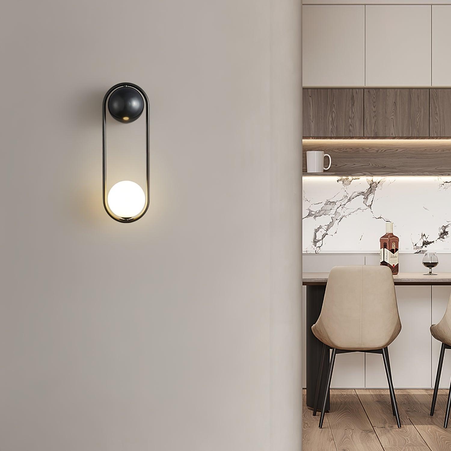 Wall Lamp with Brass Loop Frame and Glass Globe - Neutralighting