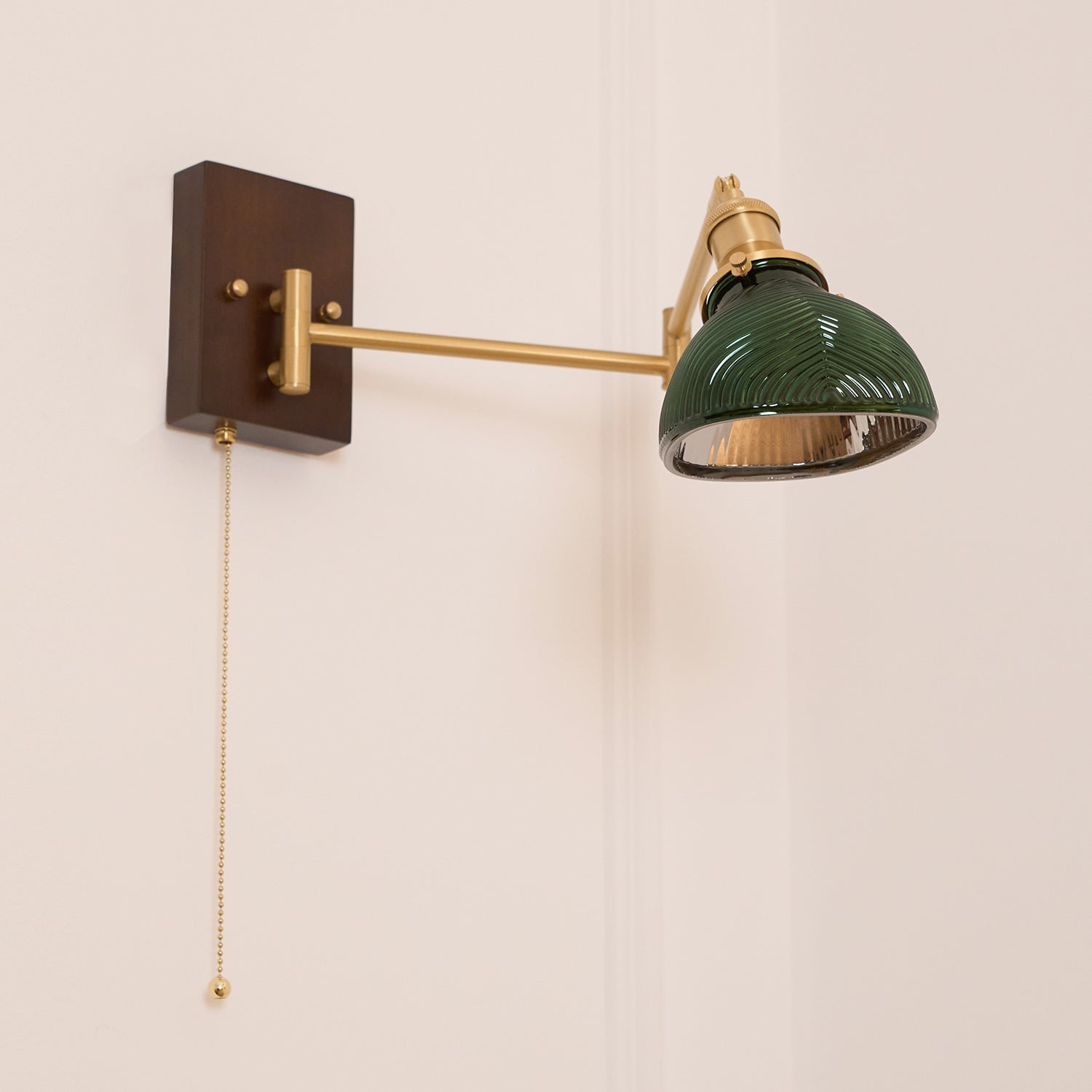 Emeric Adjustable Swing Arm Wall Lamp with Green Glass Shade - Neutralighting