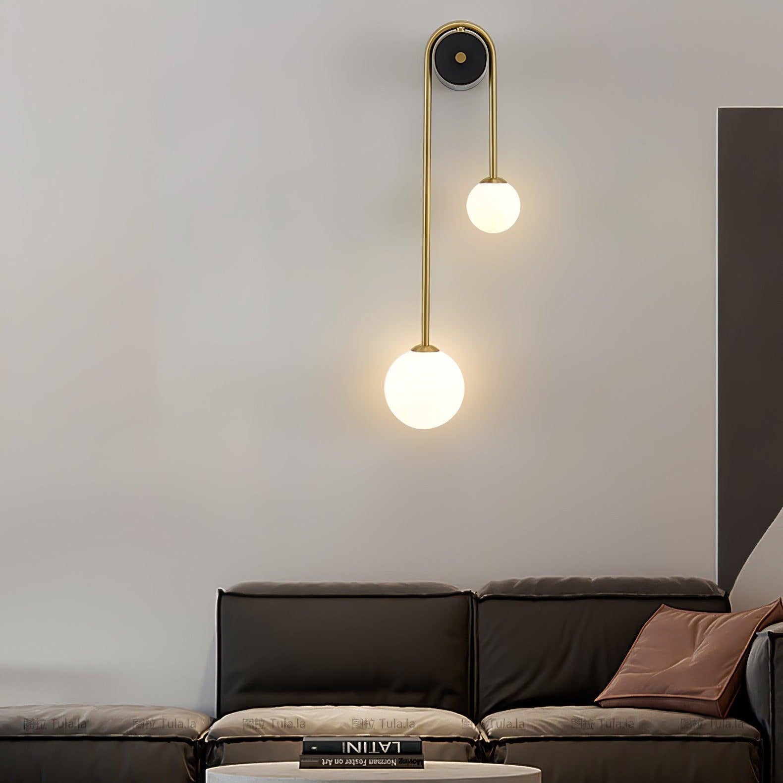 Elaro Brass Arc Wall Light - Neutralighting