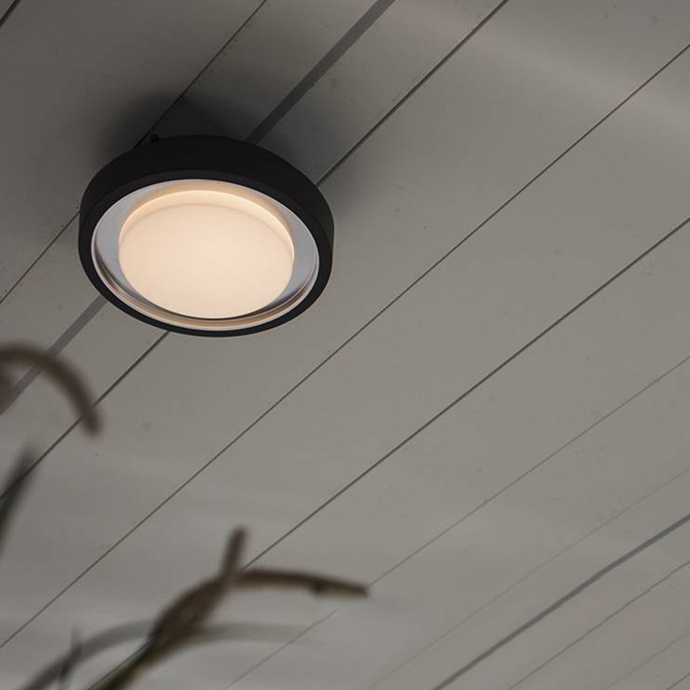 Ray Modern Circular Disc Shape Metal Outdoor Wall Lamp, Black - Neutralighting