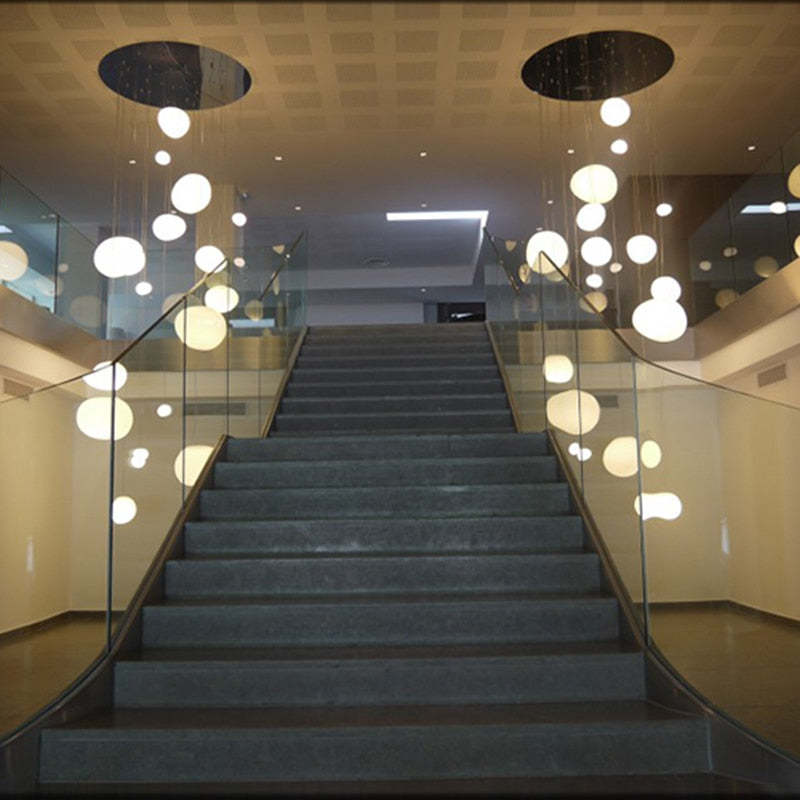 Elun Sleek Minimalist Floating Egg-shaped Glass Pendant Light - Neutralighting