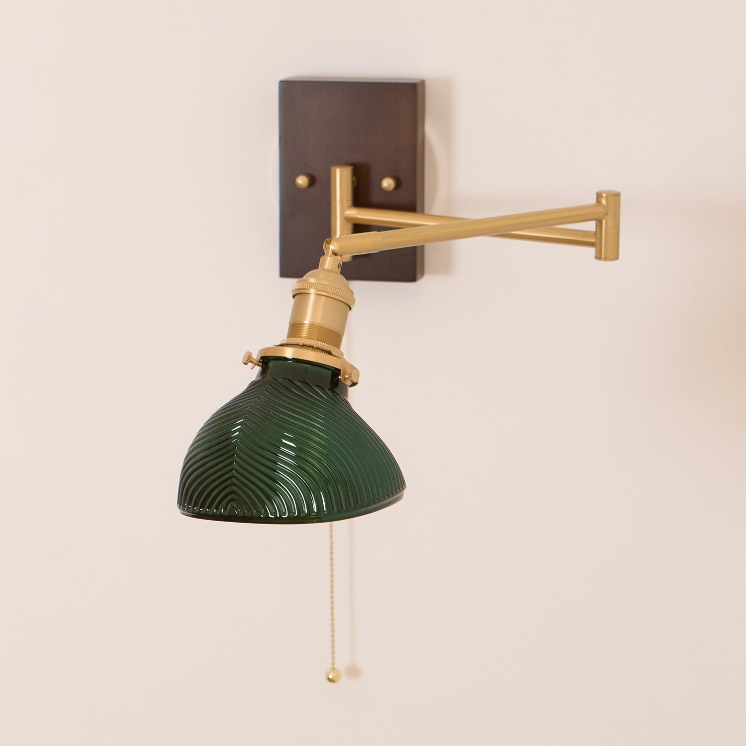 Emeric Adjustable Swing Arm Wall Lamp with Green Glass Shade - Neutralighting