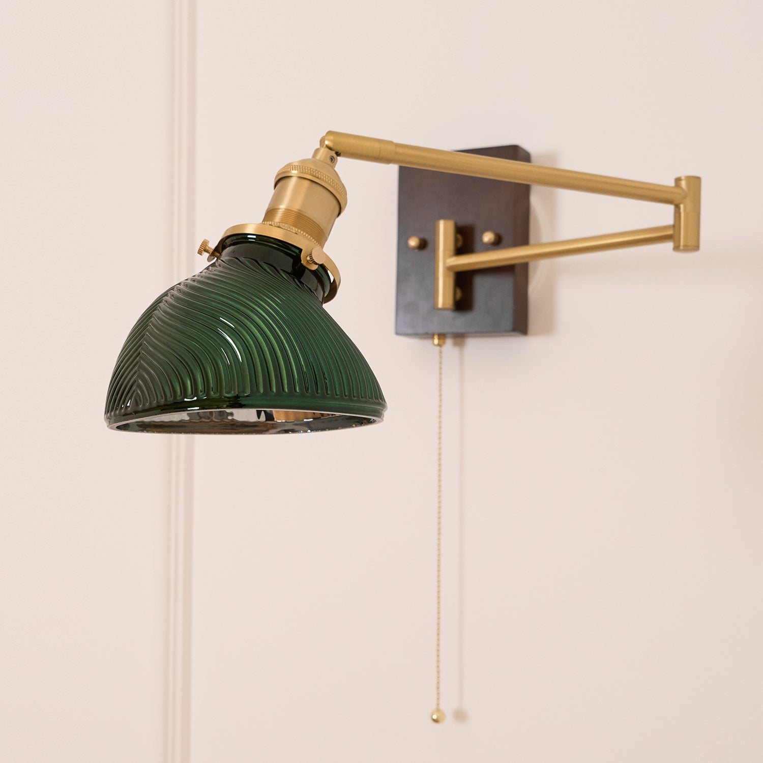 Emeric Adjustable Swing Arm Wall Lamp with Green Glass Shade - Neutralighting