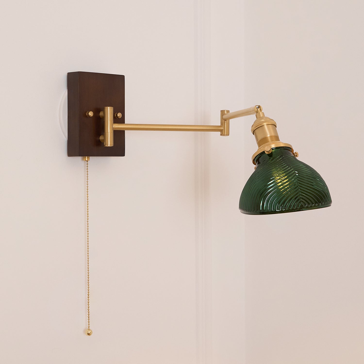 Emeric Adjustable Swing Arm Wall Lamp with Green Glass Shade - Neutralighting