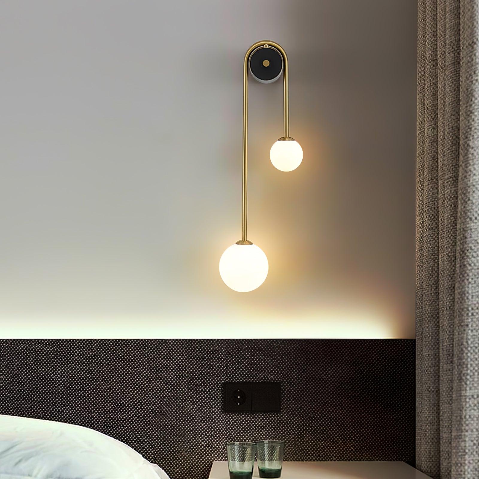 Elaro Brass Arc Wall Light - Neutralighting