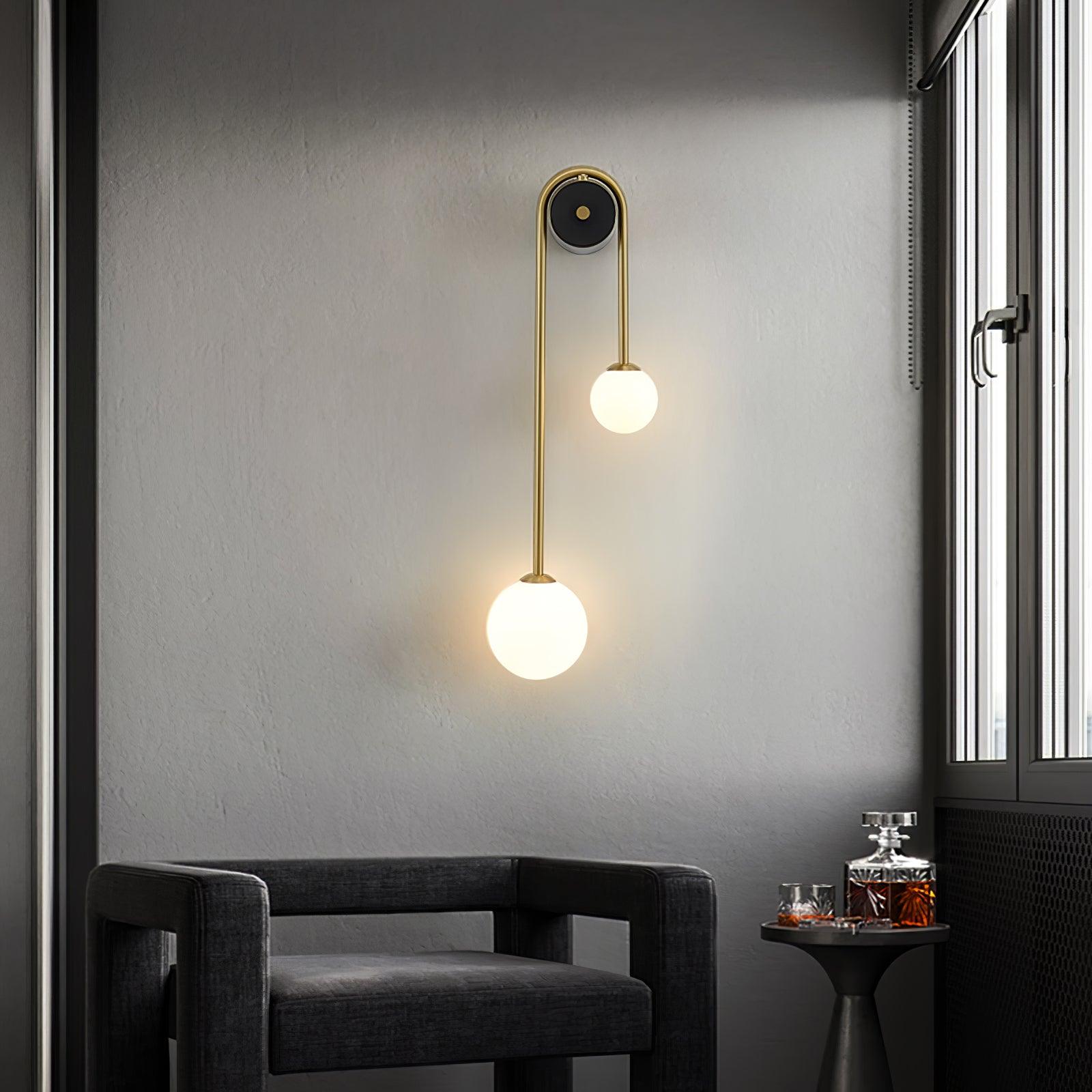 Elaro Brass Arc Wall Light - Neutralighting