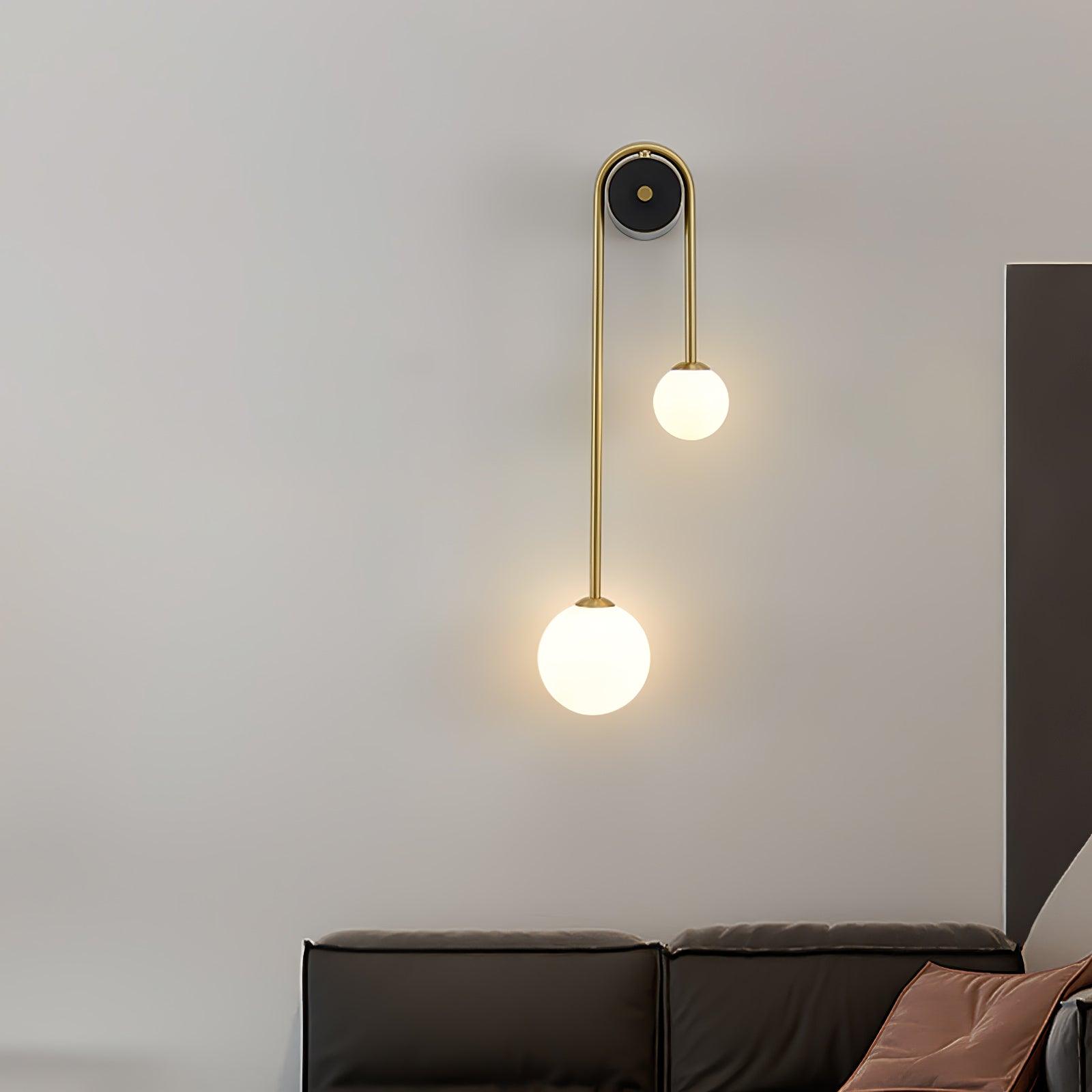 Elaro Brass Arc Wall Light - Neutralighting