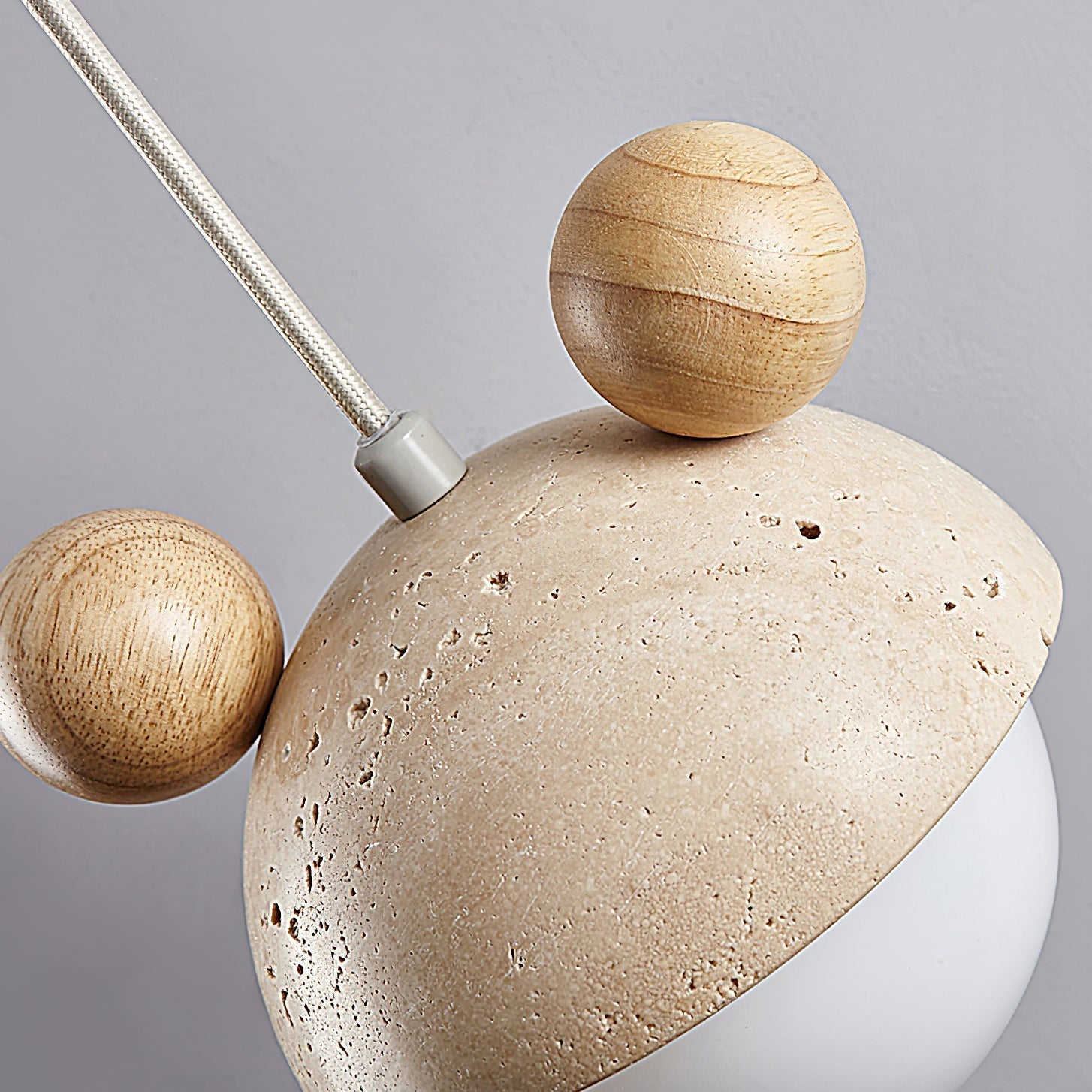 Lyraeus Character-Shaped Travertine Pendant Light - Neutralighting