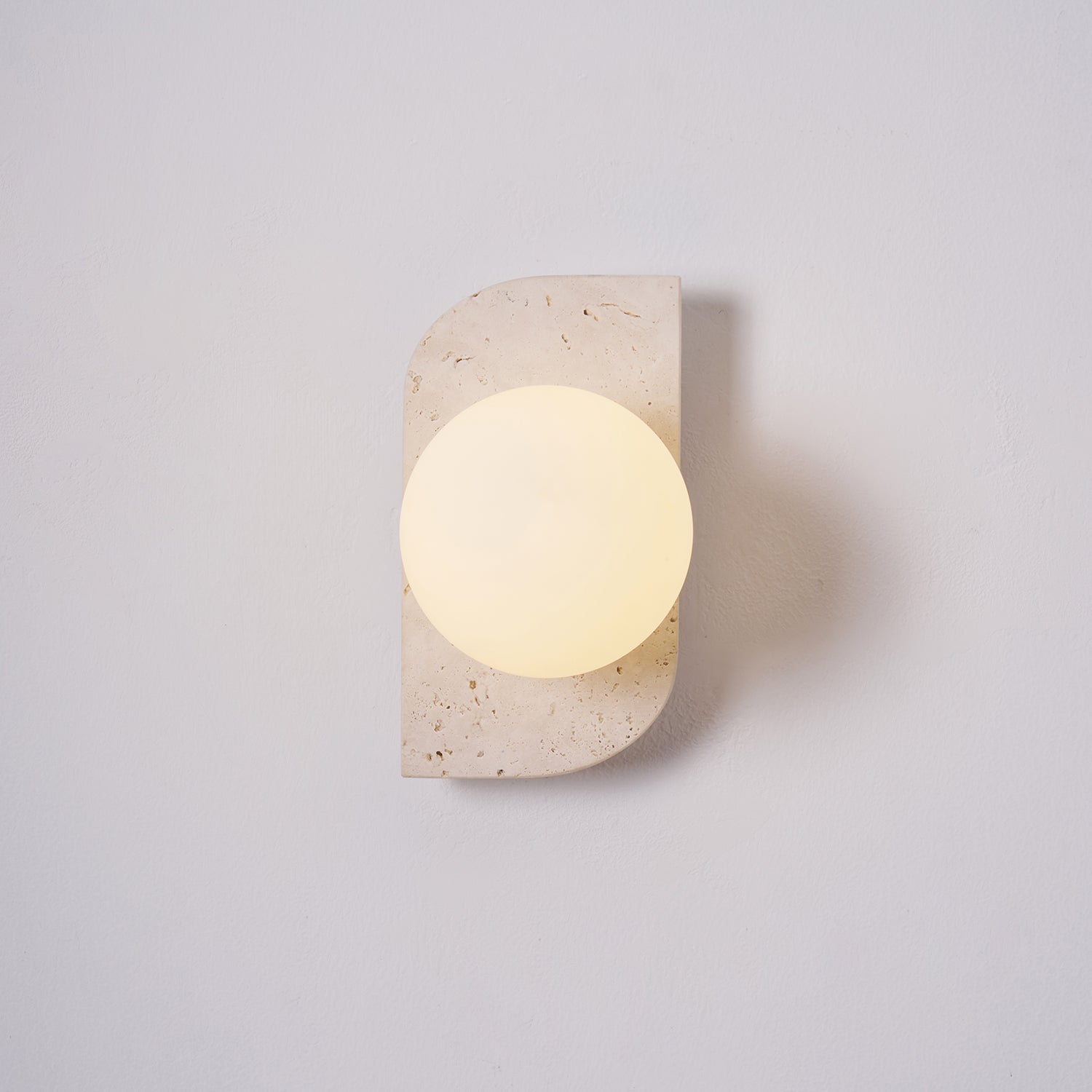 Zophaor Minimalist Travertine Plug-In Wall Light - Neutralighting