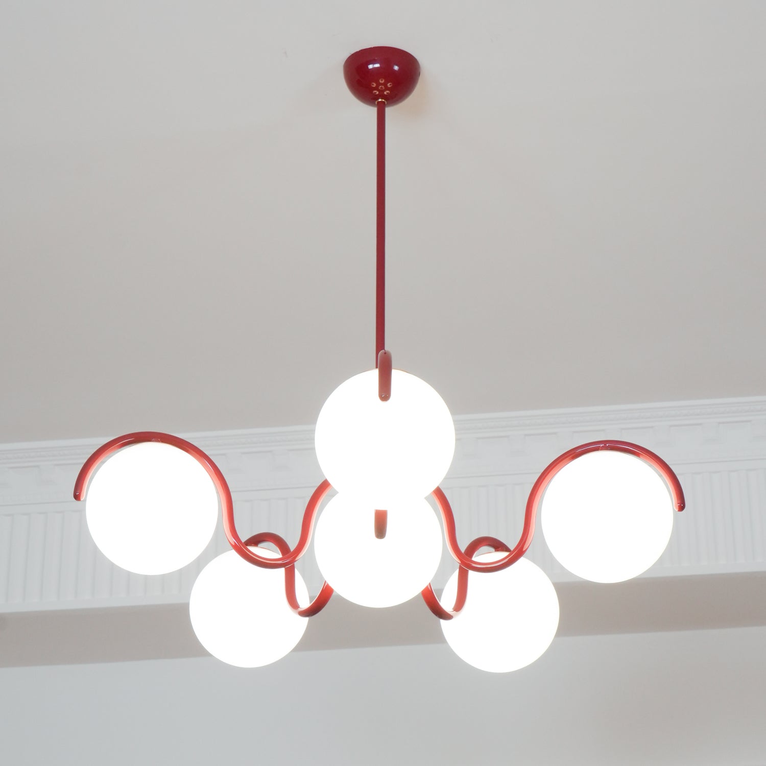 Pheva Curve Linear Chandelier Red&Silver - Neutralighting