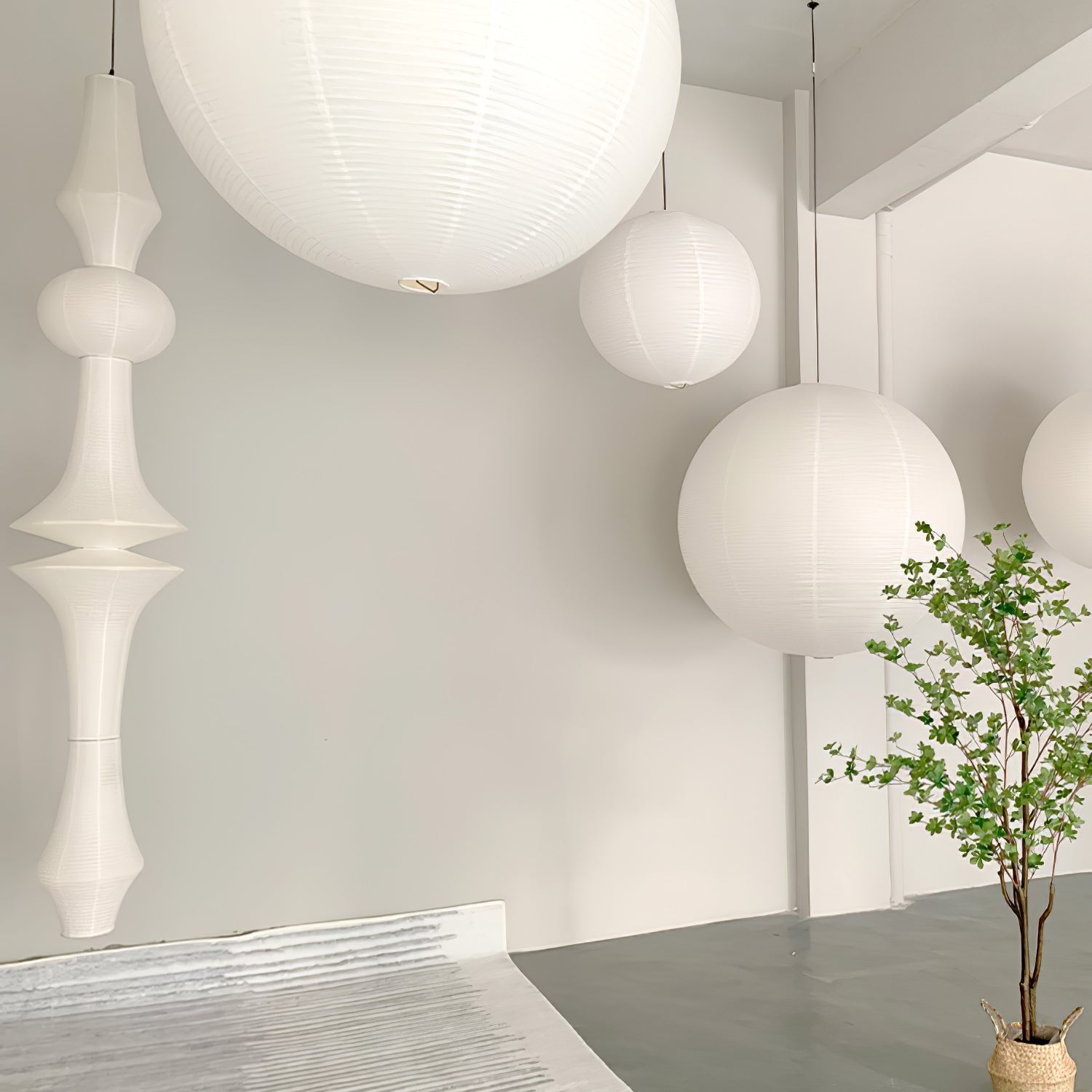 Faye Sculptural Paper Vertical Pendant Light - Neutralighting